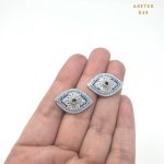Aretes Topitos Forma de Ojo Plateado con Cristales Bañado en Oro