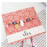 Pulsera Hilo Fucsia con Manito Concha Nacar
